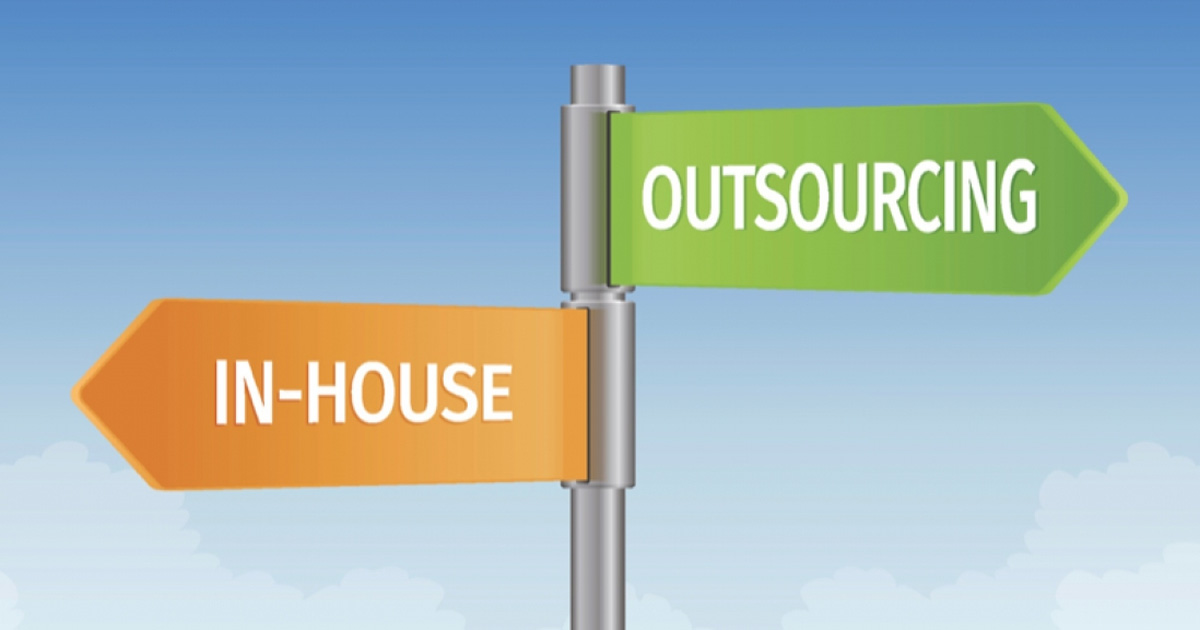 Road sign of in-house and outsourcing