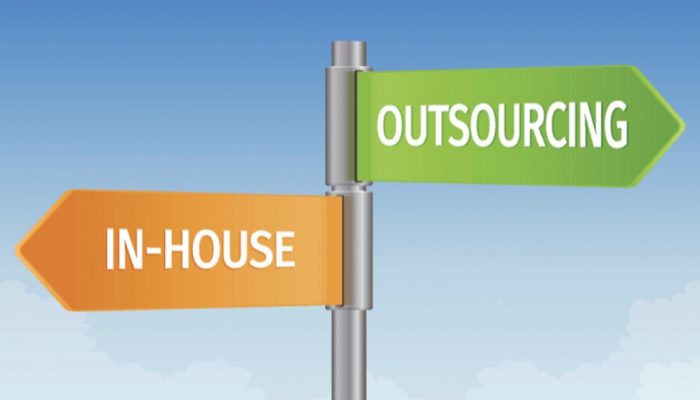 Road sign of in-house and outsourcing